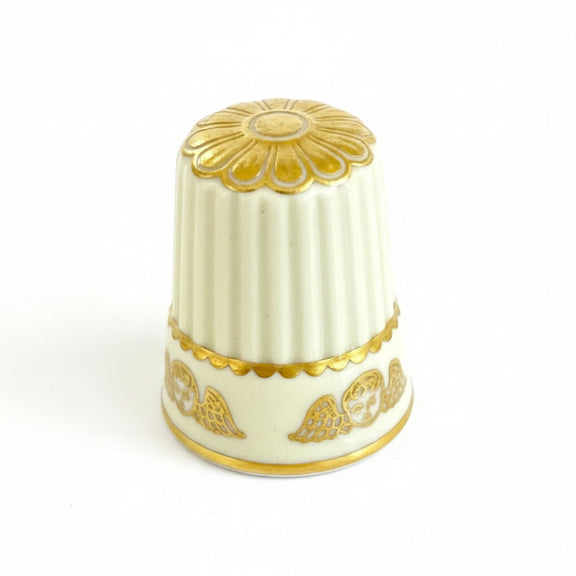 Thimble with Cherub (or Winged Head) Motif and Gold Gilt.|286907698089