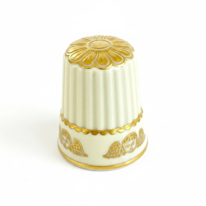 Thimble with Cherub (or Winged Head) Motif and Gold Gilt.|286907698089