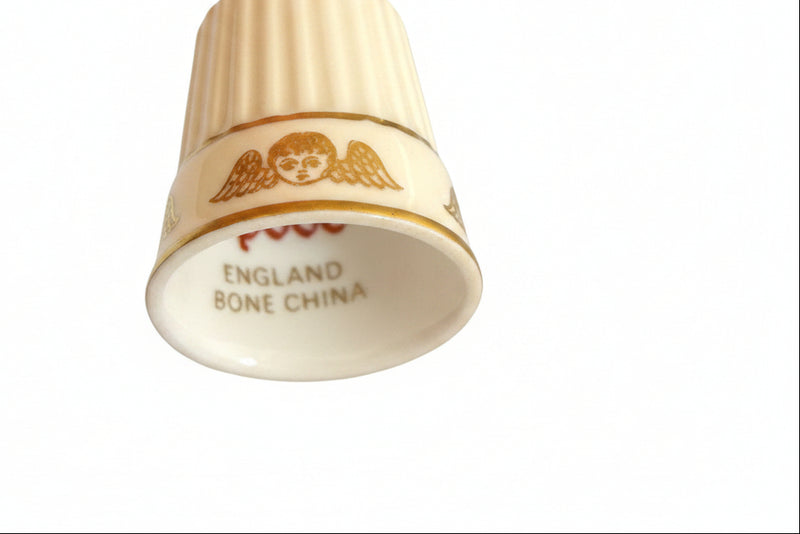 Thimble with Cherub (or Winged Head) Motif and Gold Gilt.|286907698089